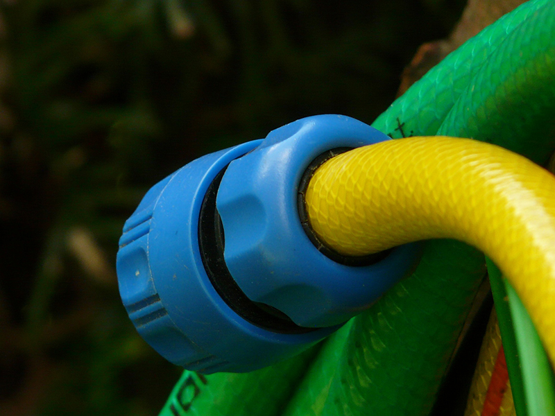 Detach and store garden hoses as part of winter prep