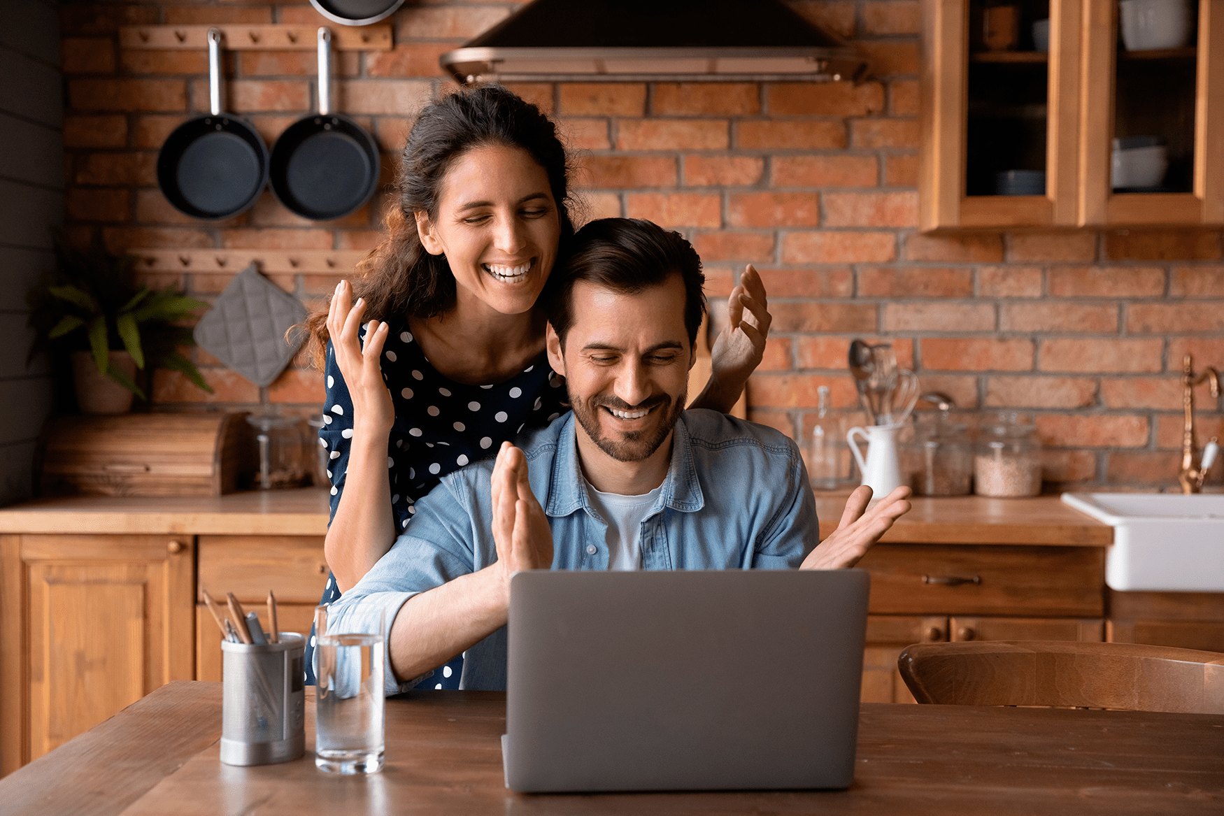 Excited couple reviews the specials from All American Heating online